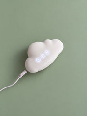 Mousse charging with illuminated controls on a sage green background