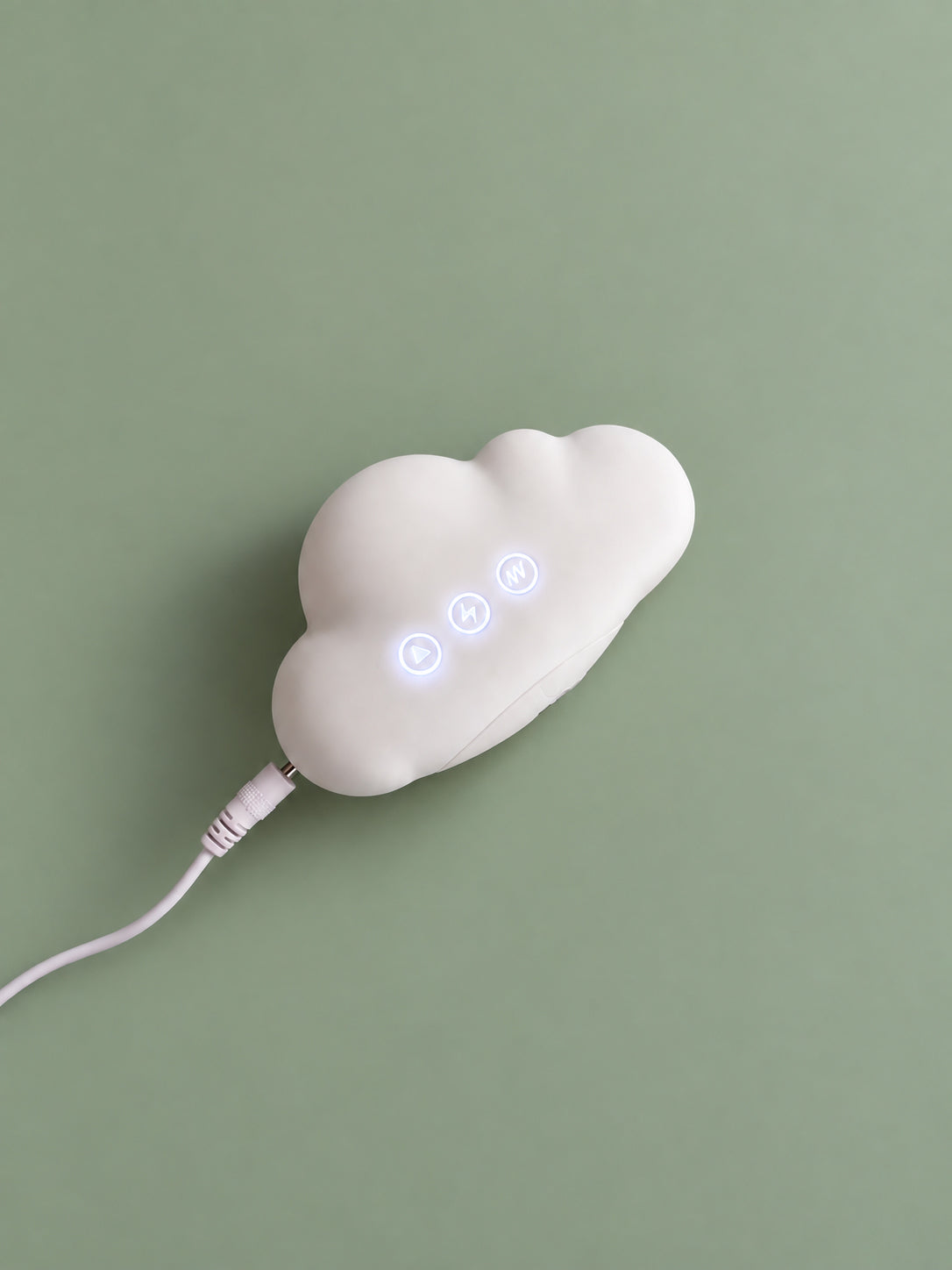 Mousse charging with illuminated controls on a sage green background