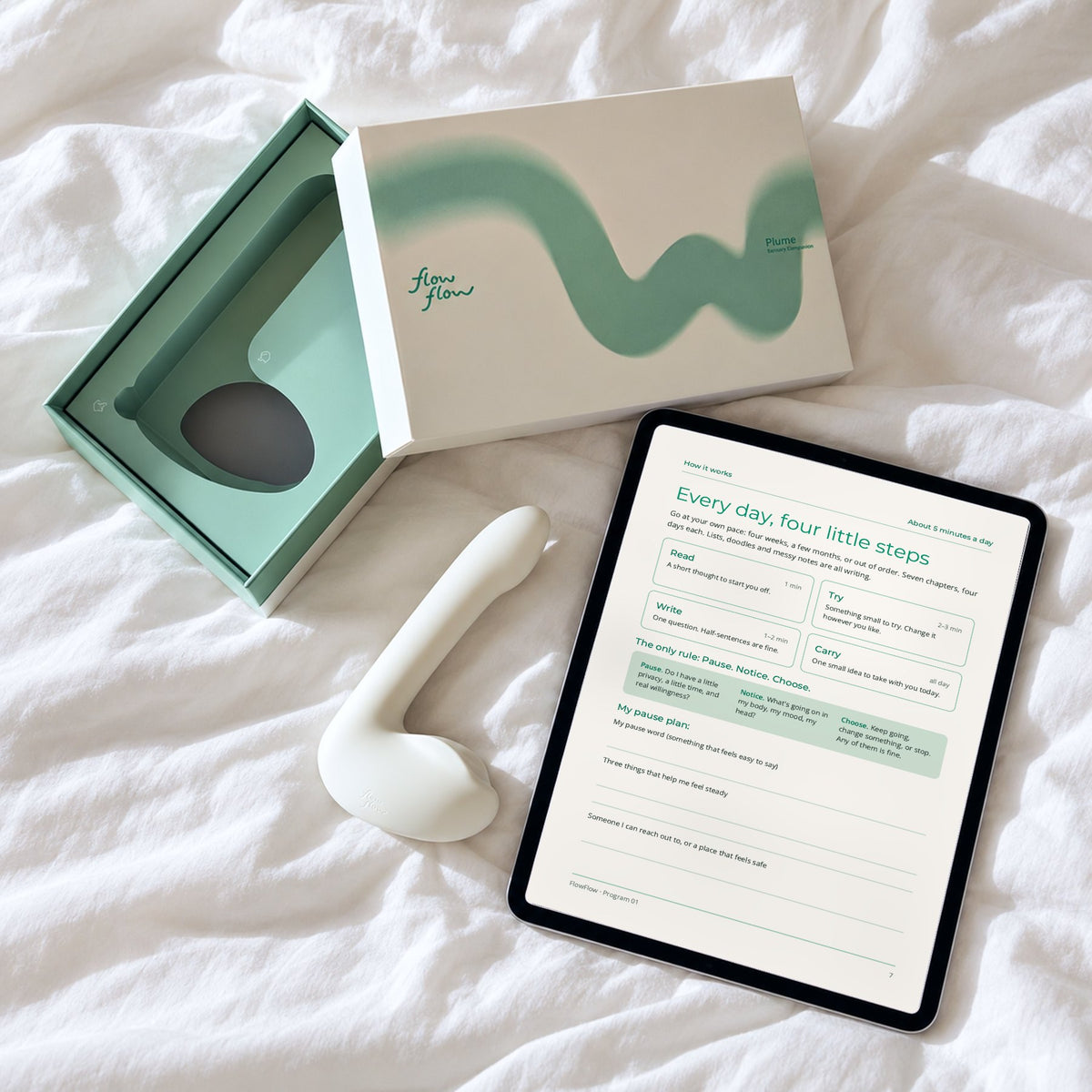 FlowFlow wellness companion beside the 28-day body awareness journal